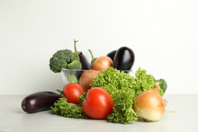 Photo of Different fresh vegetables on table. Food poisoning concept