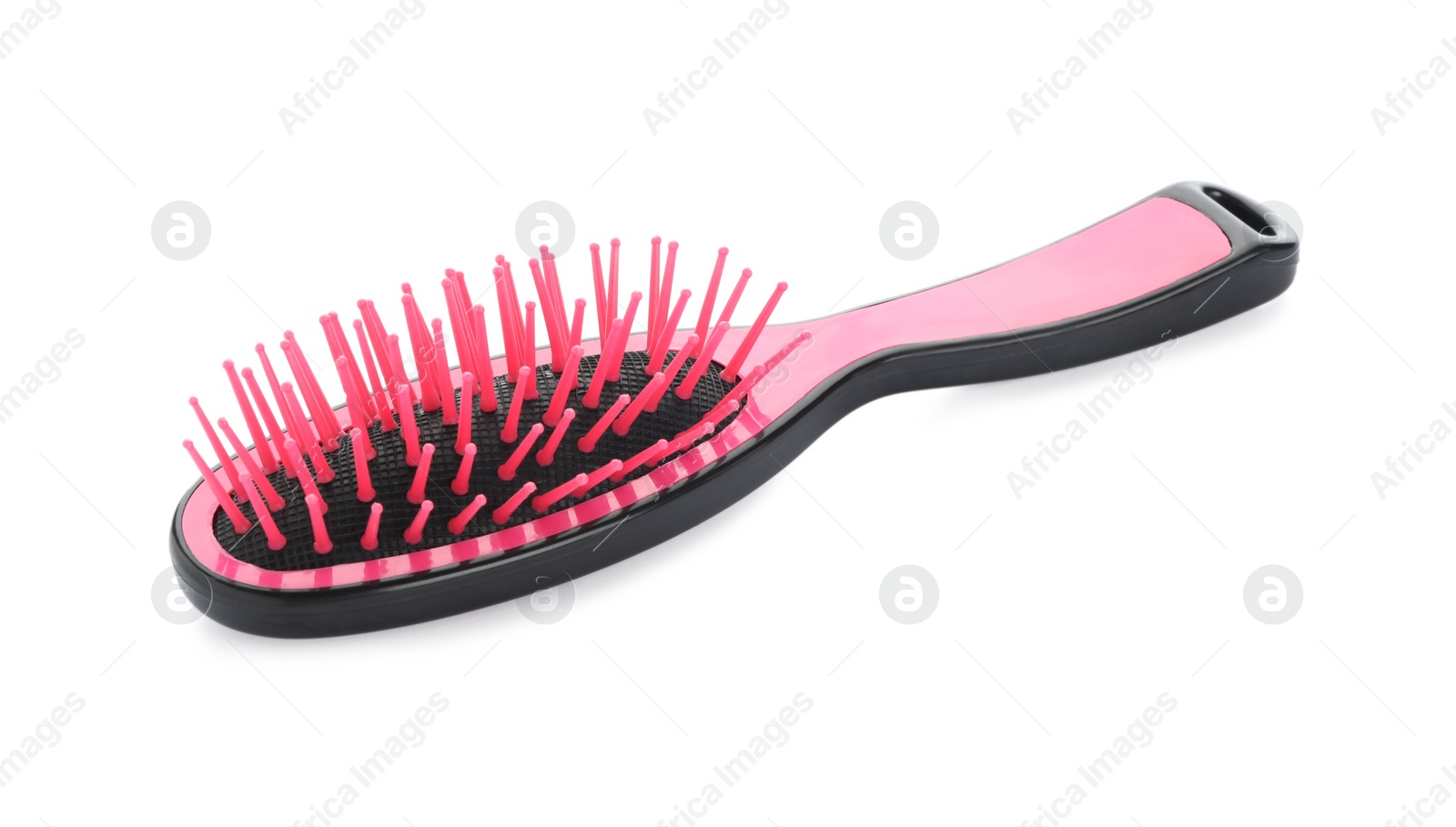 Photo of New modern hair brush isolated on white