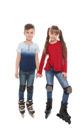 Photo of Boy and girl with inline roller skates on white background