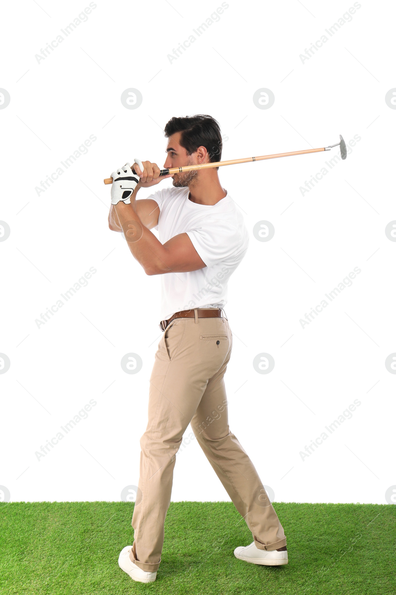 Photo of Young man playing golf on white background