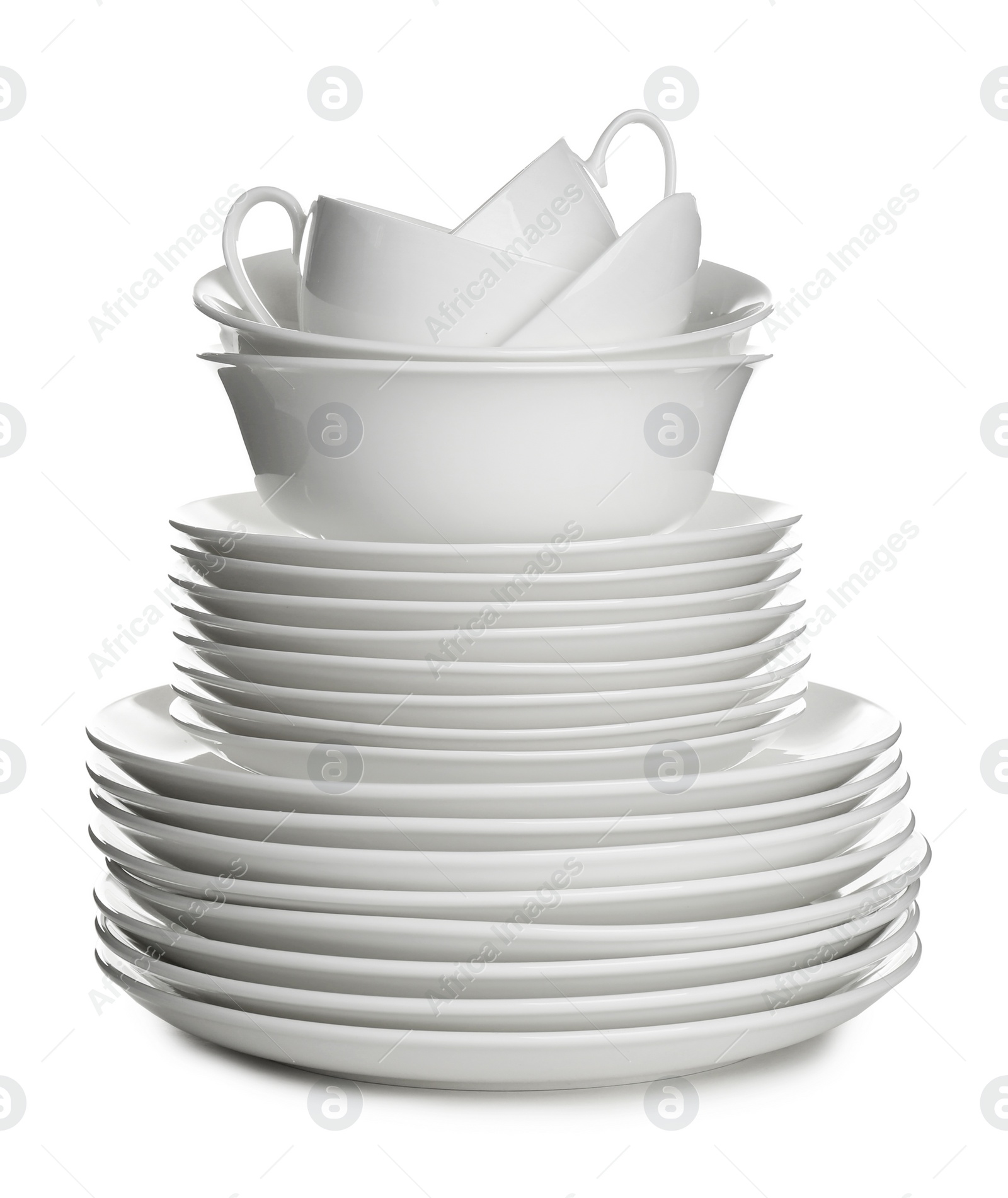 Photo of Stack of ceramic dishware on white background