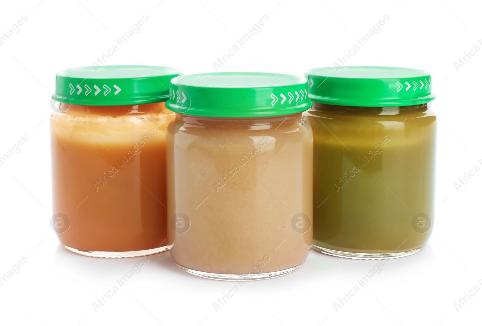 Photo of Jars with healthy baby food on white background