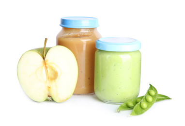 Photo of Jars with baby food, fresh pod with peas and apple on white background