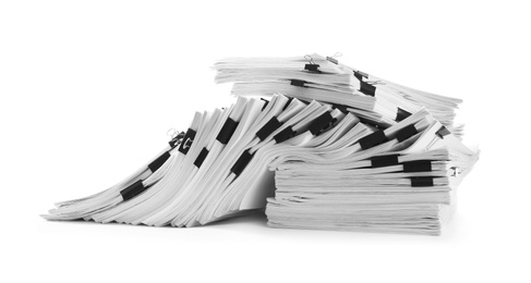 Pile of documents with binder clips on white background