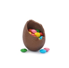 Photo of Broken chocolate egg with colorful candies on white background