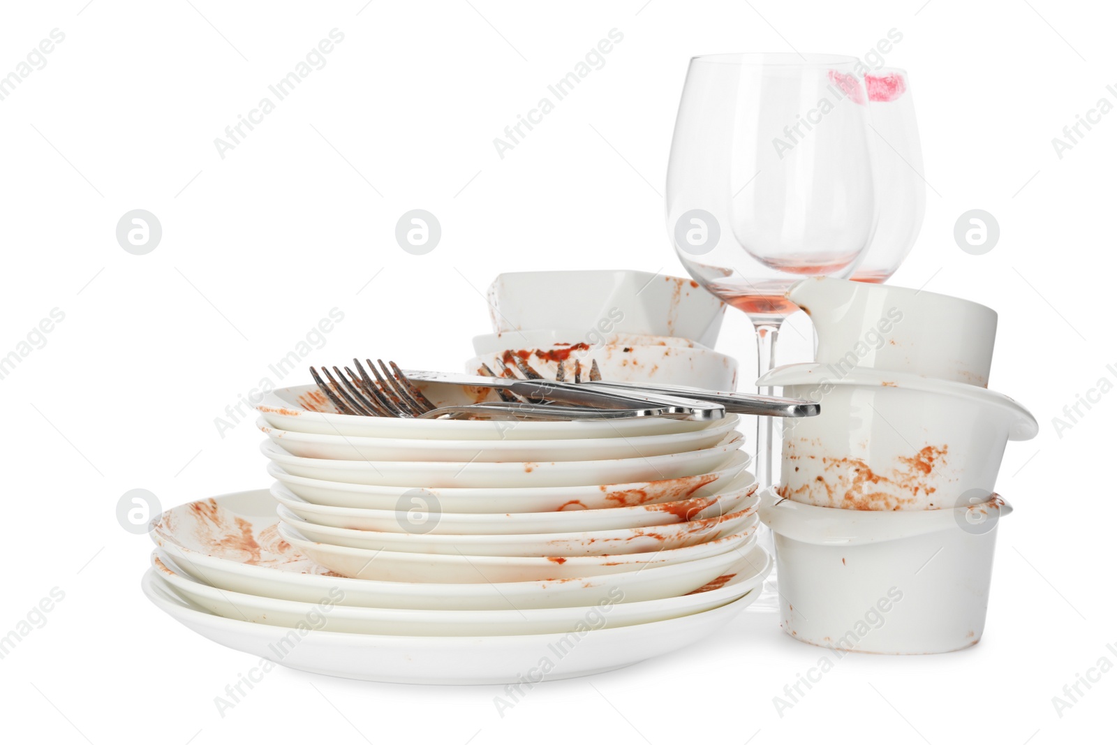 Photo of Set of dirty dishes isolated on white