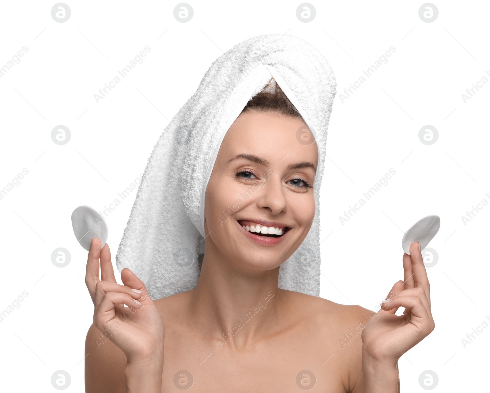 Photo of Removing makeup. Smiling woman with cotton pads on white background