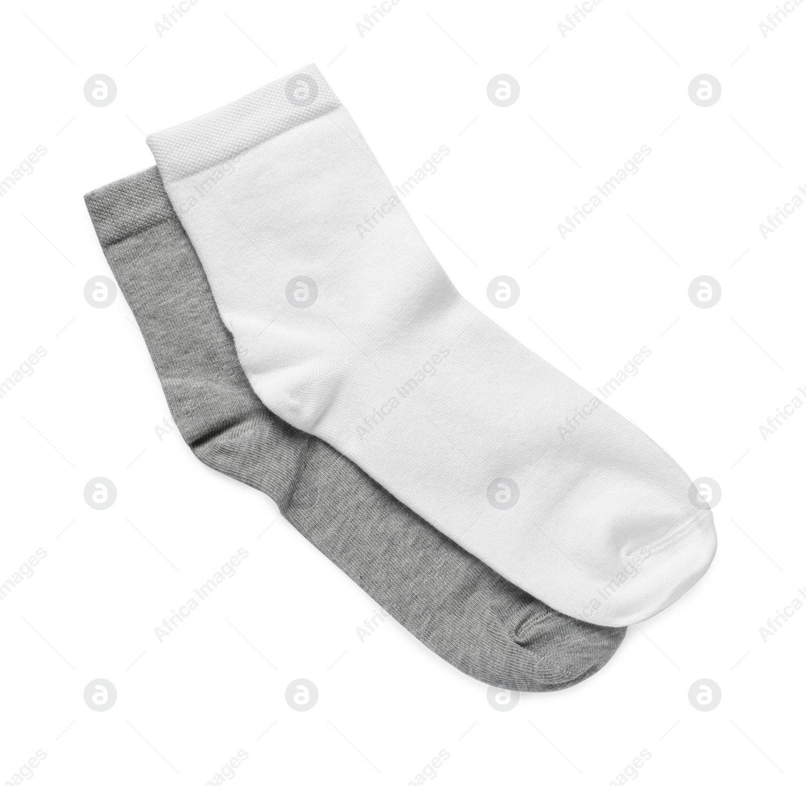 Photo of Different socks isolated on white, top view