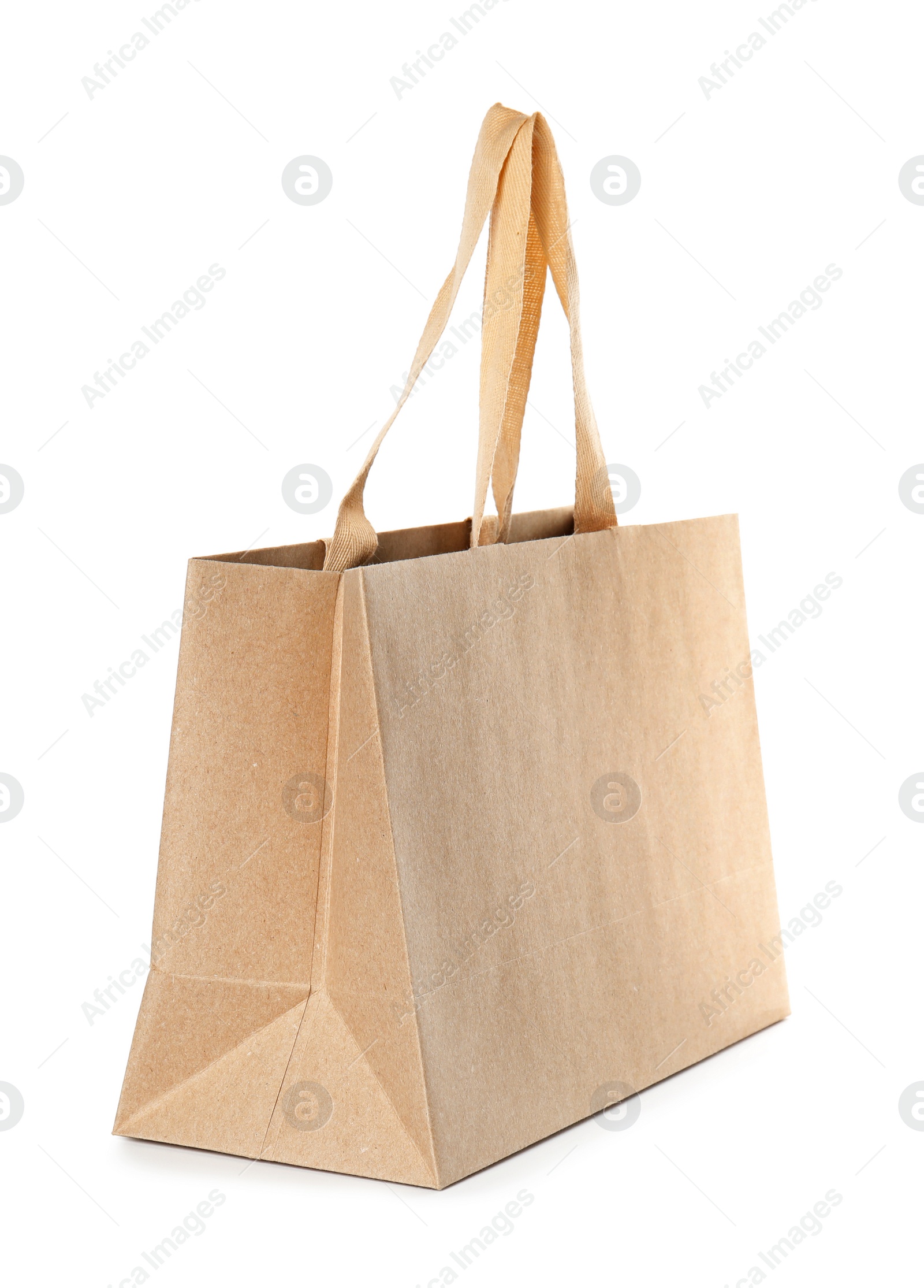 Photo of Paper shopping bag isolated on white. Mock up for design