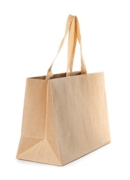 Photo of Paper shopping bag isolated on white. Mock up for design