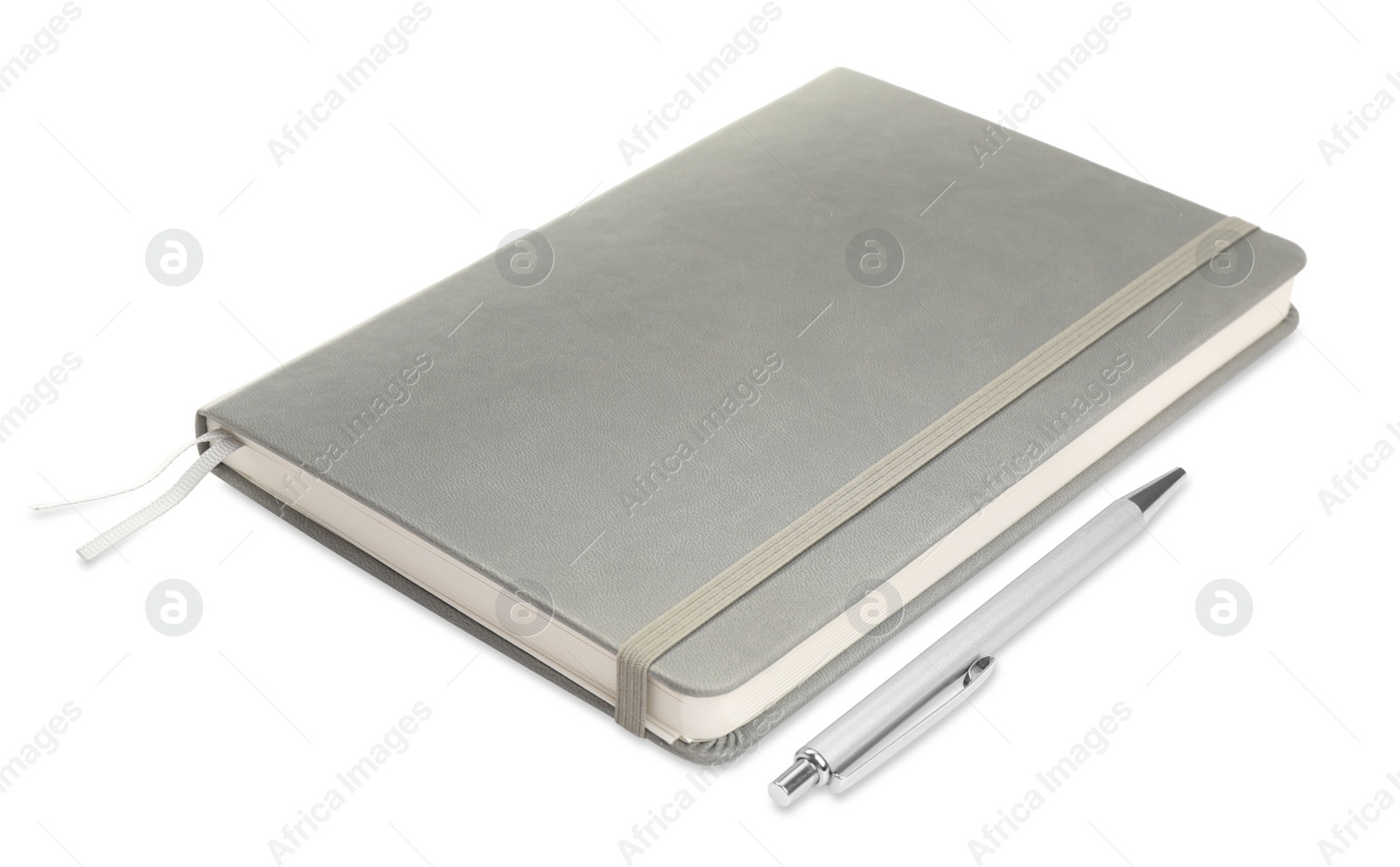 Photo of Closed grey notebook with pen isolated on white