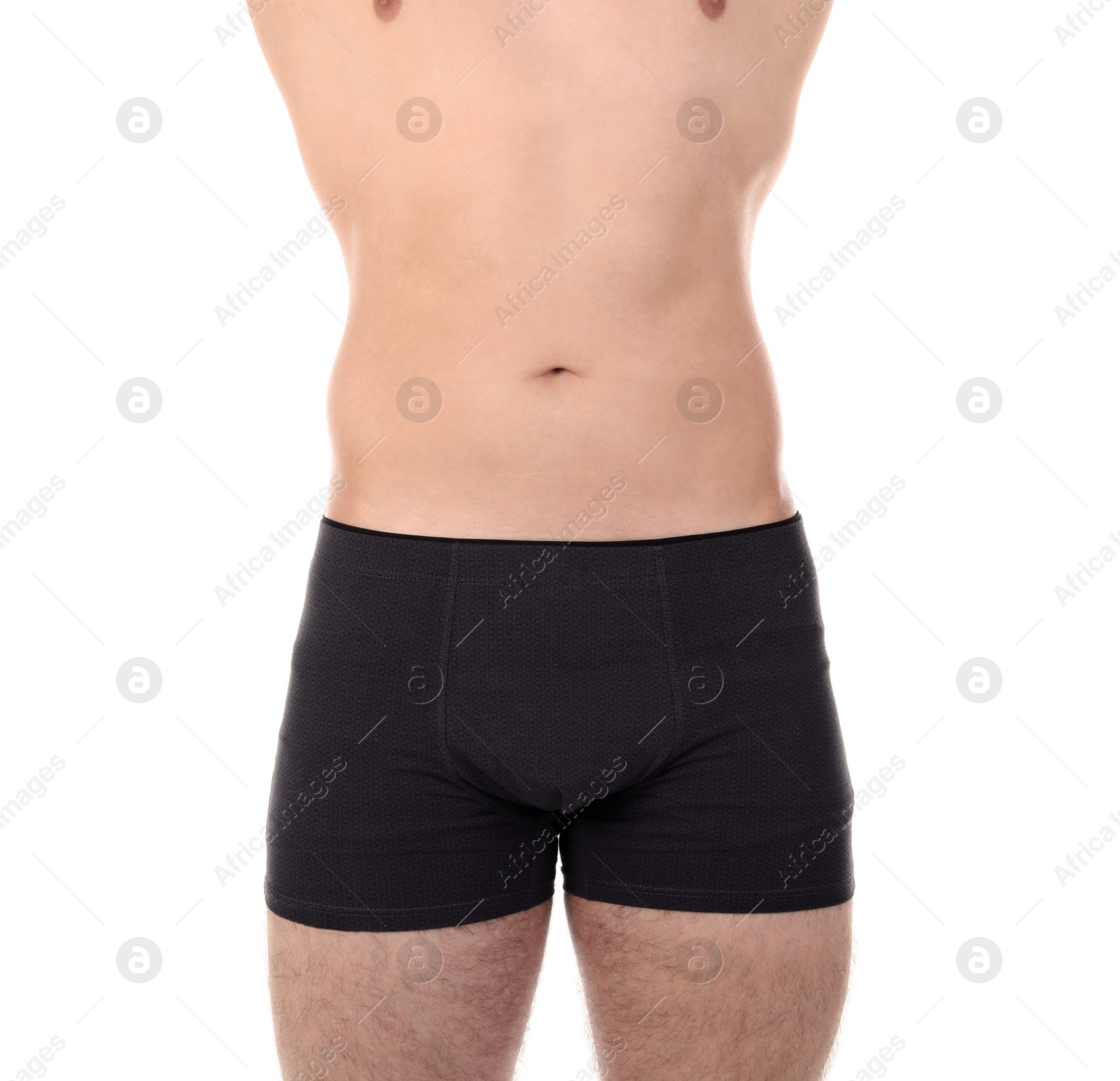 Photo of Attractive young man in underwear on white background