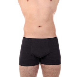 Photo of Attractive young man in underwear on white background