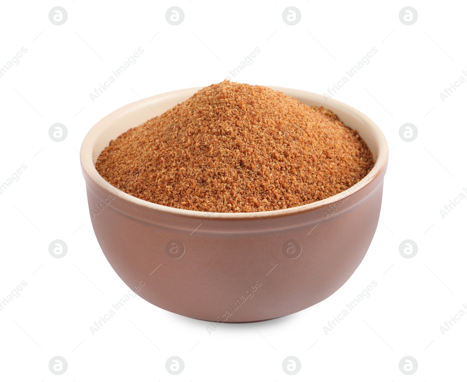 Photo of Natural coconut sugar in bowl isolated on white