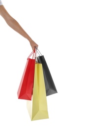 Woman with paper shopping bags on white background, closeup