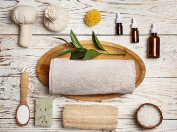 Photo of Beautiful composition with spa cosmetics and accessories on wooden background