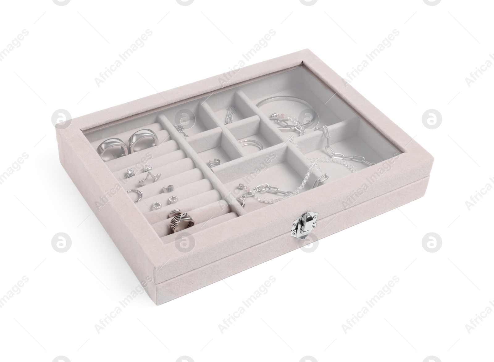 Photo of Jewelry box with many different silver accessories isolated on white