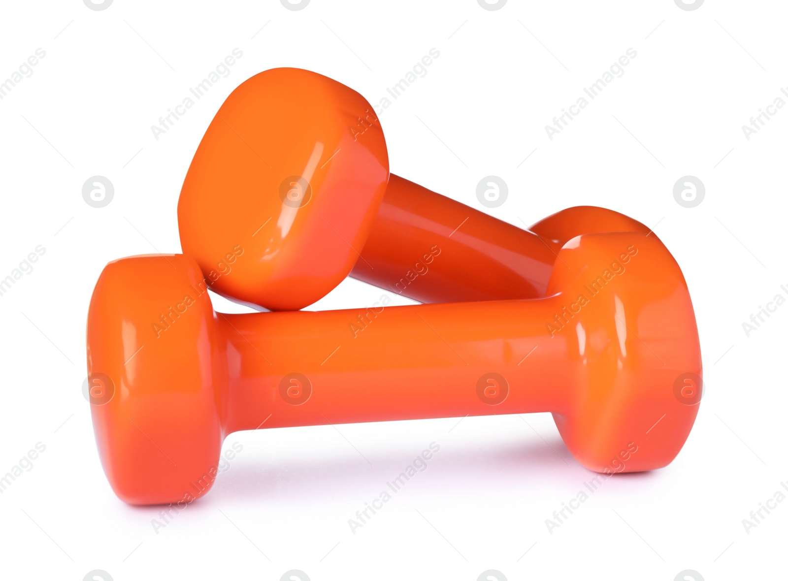 Photo of Color dumbbells on white background. Home fitness