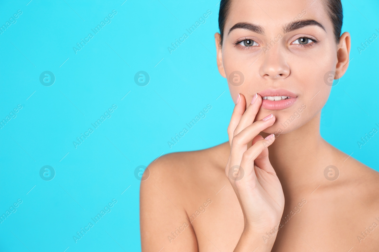 Photo of Portrait of beautiful young woman and space for text on color background. Cosmetic surgery concept