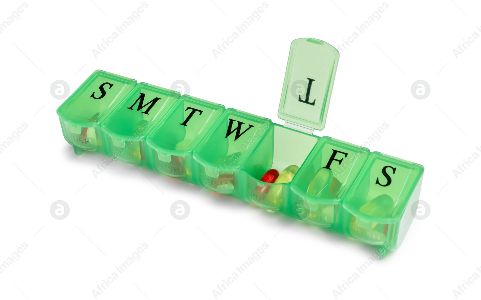 Photo of Different pills in organizer isolated on white