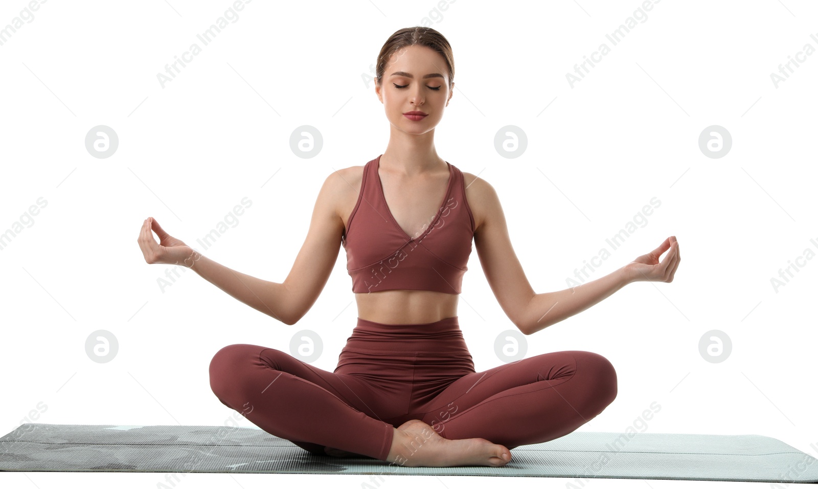 Photo of Beautiful young woman meditating on white background