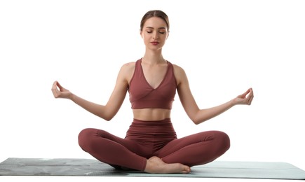 Beautiful young woman meditating on white background