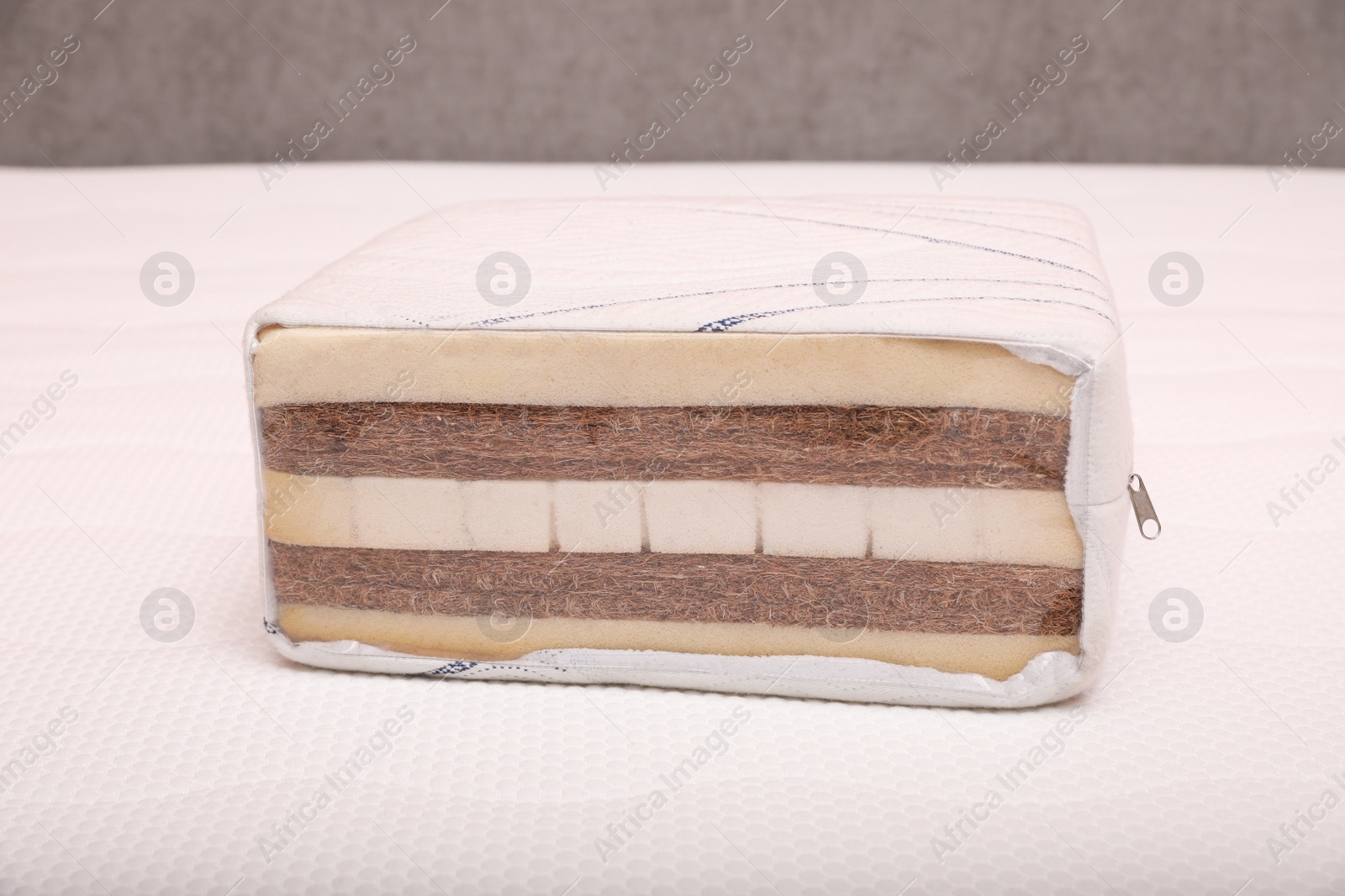 Image of Sample of modern orthopedic mattress on textile