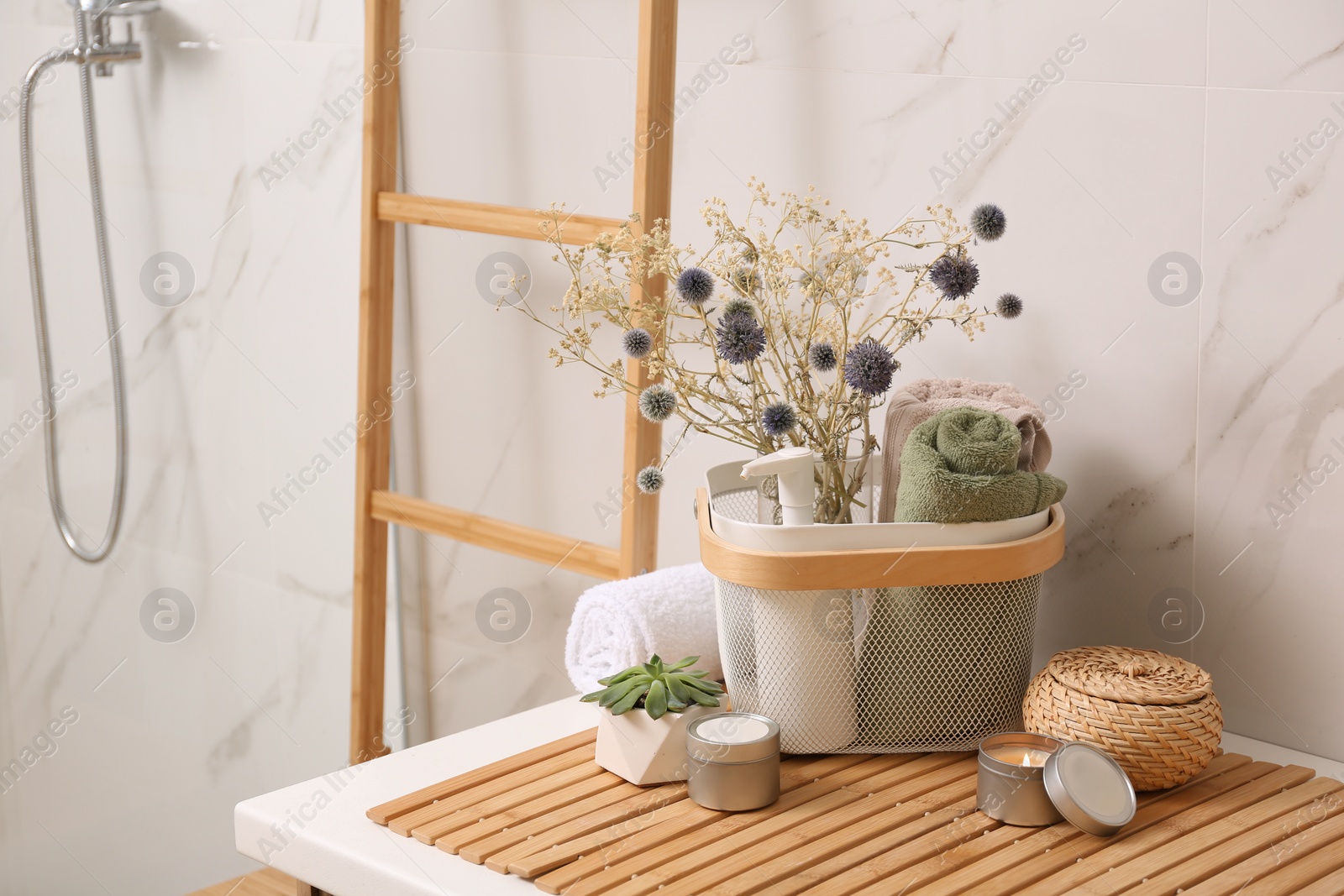 Photo of Toiletries and personal hygiene products on table in bathroom