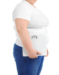 Overweight woman with scales on white background