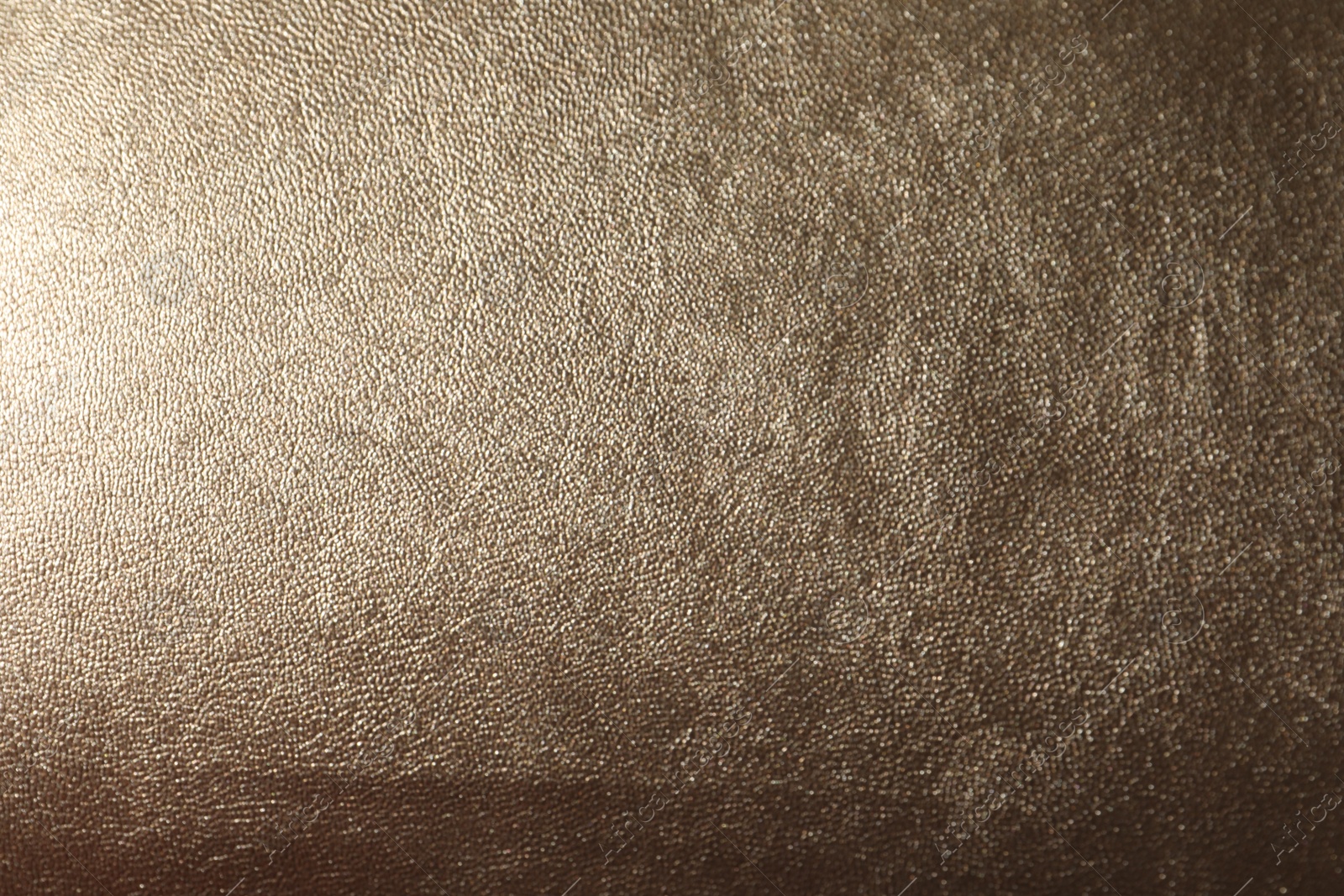 Photo of Texture of light brown leather as background, closeup