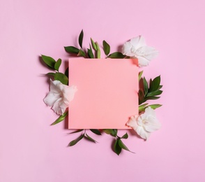 Photo of Beautiful gladiolus flowers and blank card on pink background, flat lay. Space for text