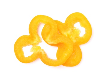 Photo of Slices of orange bell pepper on white background, top view