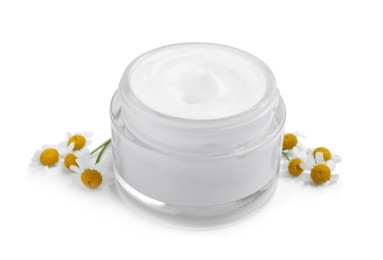Photo of Jar of body cream with camomile flowers on white background
