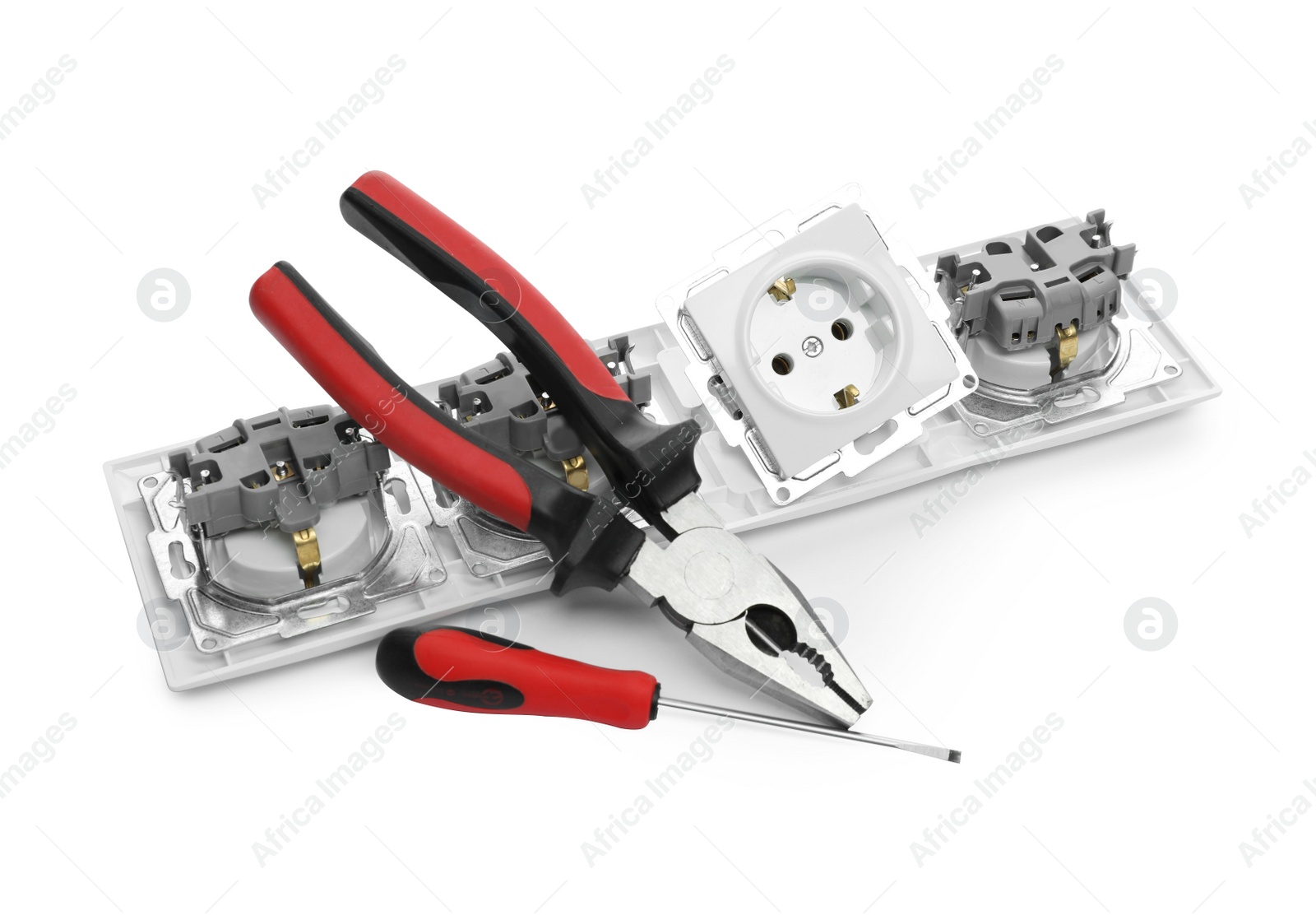 Photo of Set of sockets and electrician's tools isolated on white