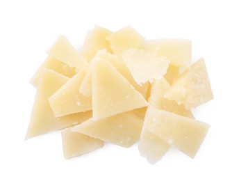 Pile of parmesan cheese pieces on white background, top view