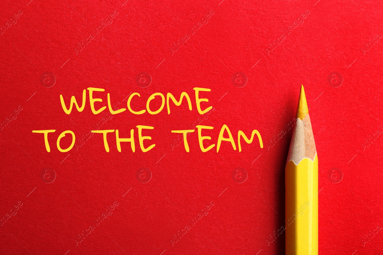 Image of Phrase Welcome to the team and pencil on red background, top view