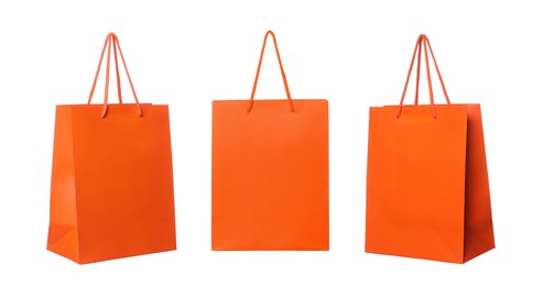 Orange shopping bag isolated on white, different sides