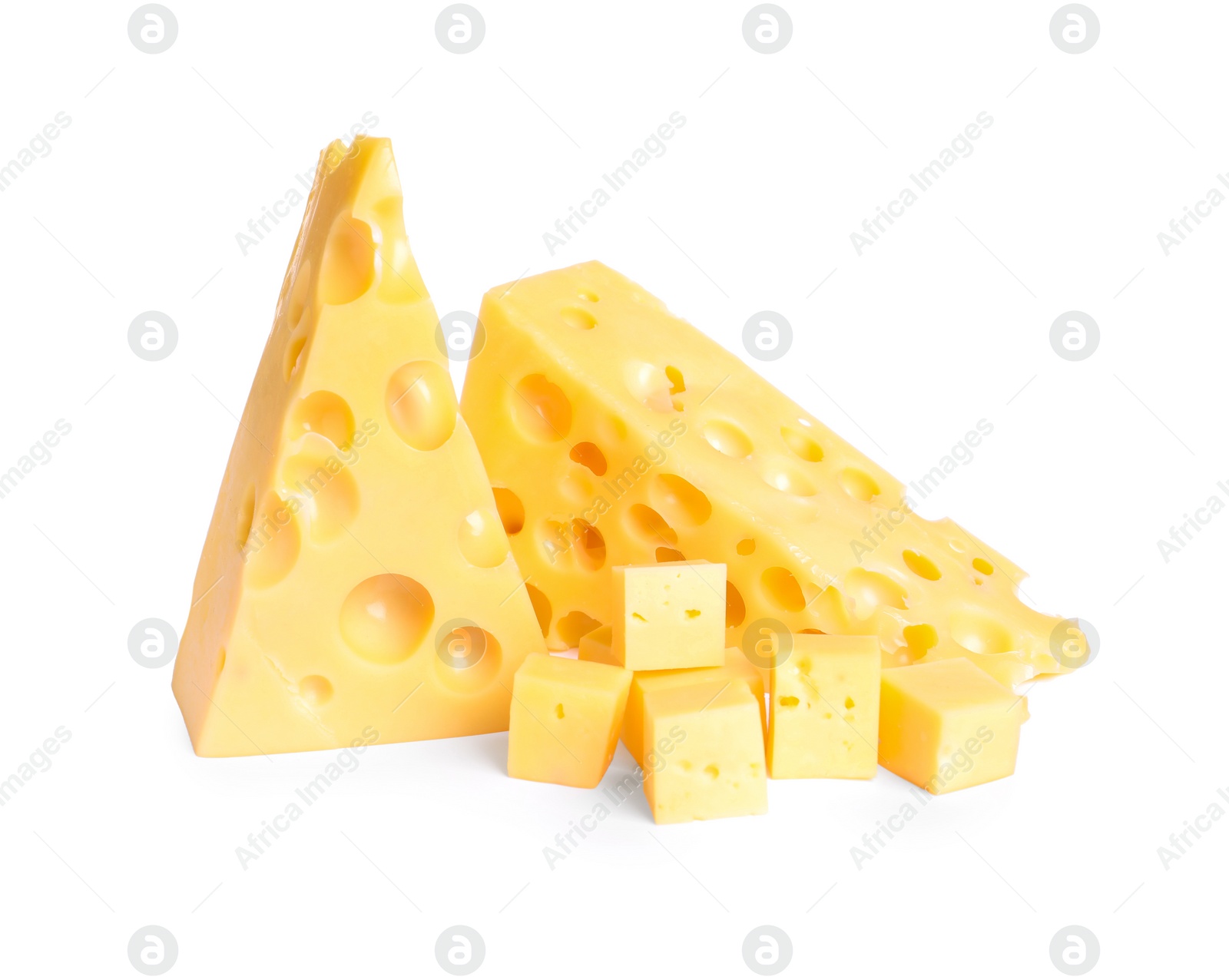 Photo of Pieces of cheese with holes on white background