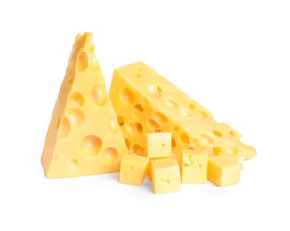 Pieces of cheese with holes on white background