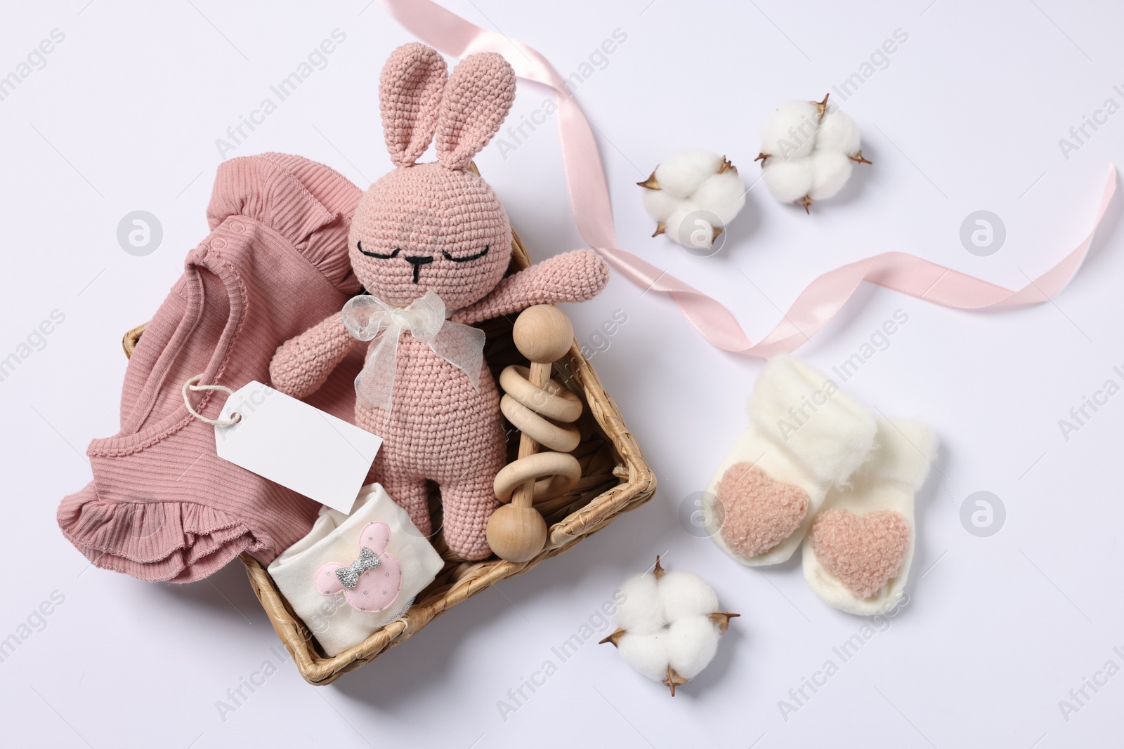 Photo of Flat lay composition with different baby accessories on white background