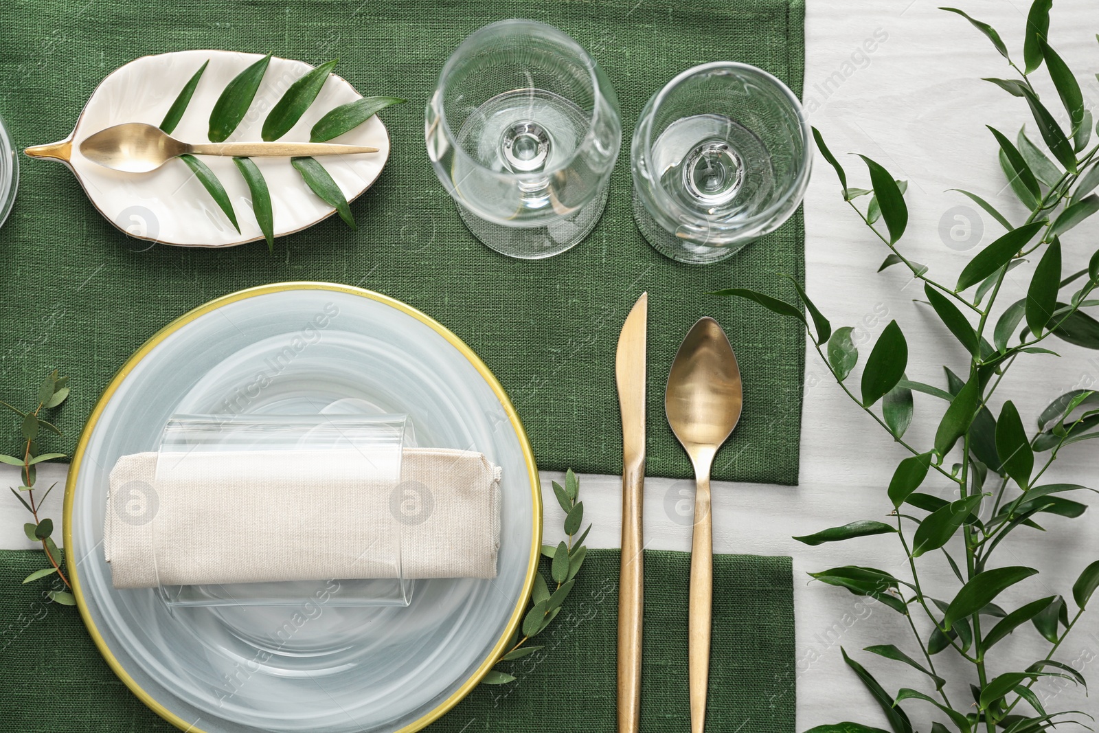 Photo of Elegant festive setting on white wooden table, flat lay