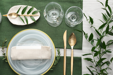 Elegant festive setting on white wooden table, flat lay