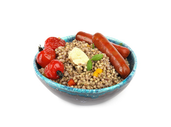 Photo of Tasty buckwheat porridge with sausages and vegetables isolated on white