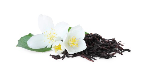 Photo of Dry green tea and fresh jasmine flowers isolated on white