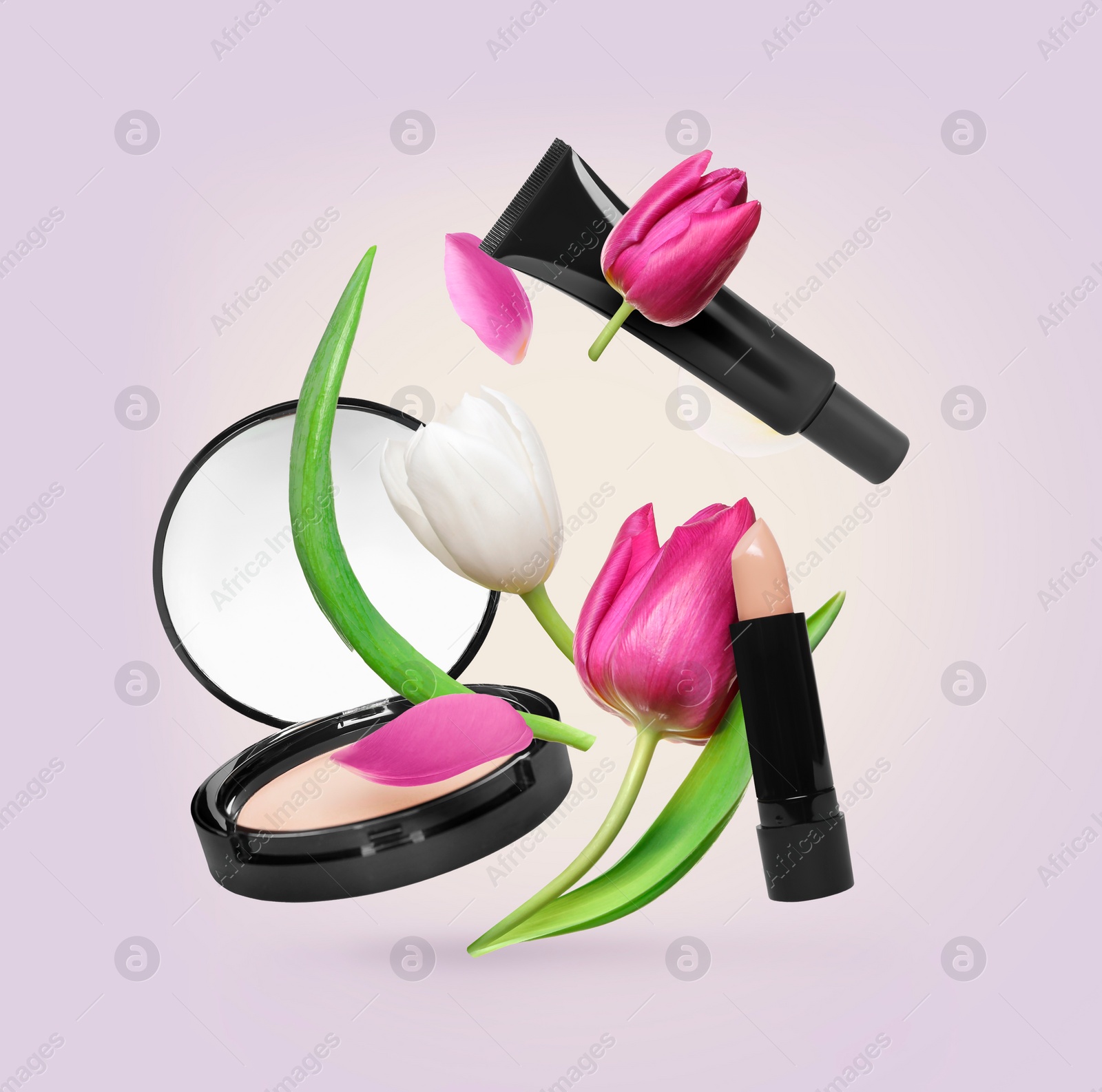 Image of Spring flowers and makeup products in air on pale violet background