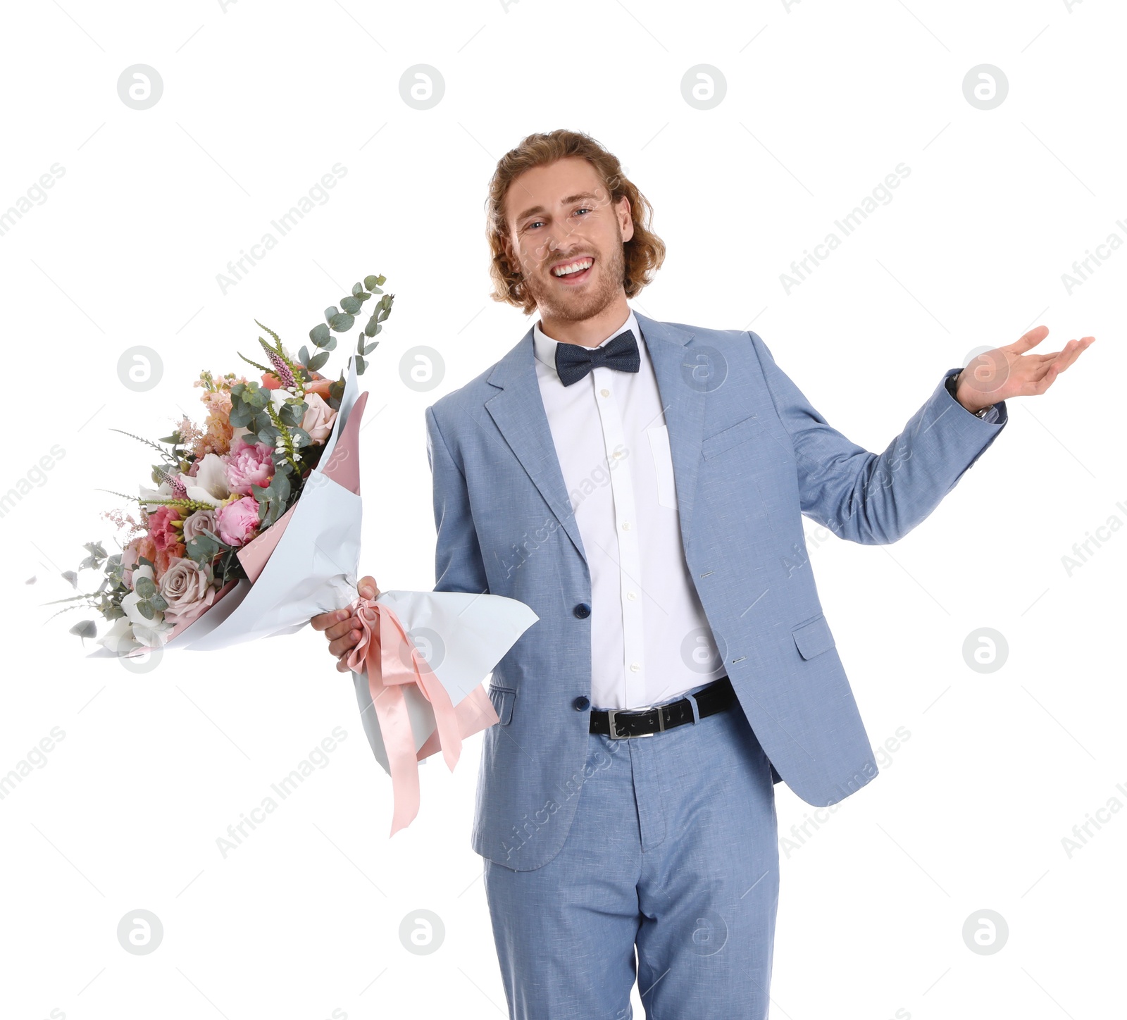 Photo of Young handsome man in stylish suit with beautiful flower bouquet on white background