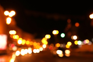 Blurred view of beautiful city at night. Bokeh effect