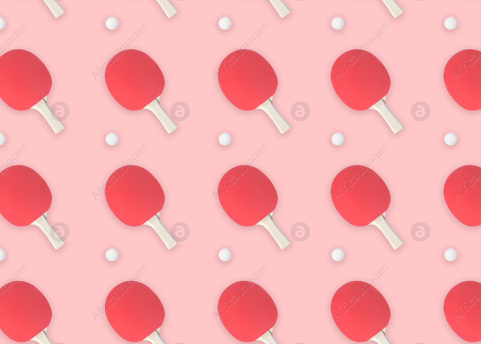 Image of Table tennis paddles and balls on pink background, flat lay
