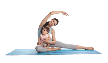 Photo of Young woman doing exercise with her son isolated on white. Time for fitness