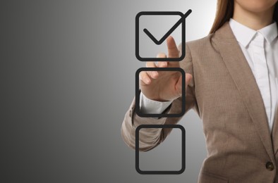 Image of Woman pointing at check mark in box on virtual screen, closeup. Space for text